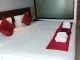 Bed at the Paripas Patong Resort
